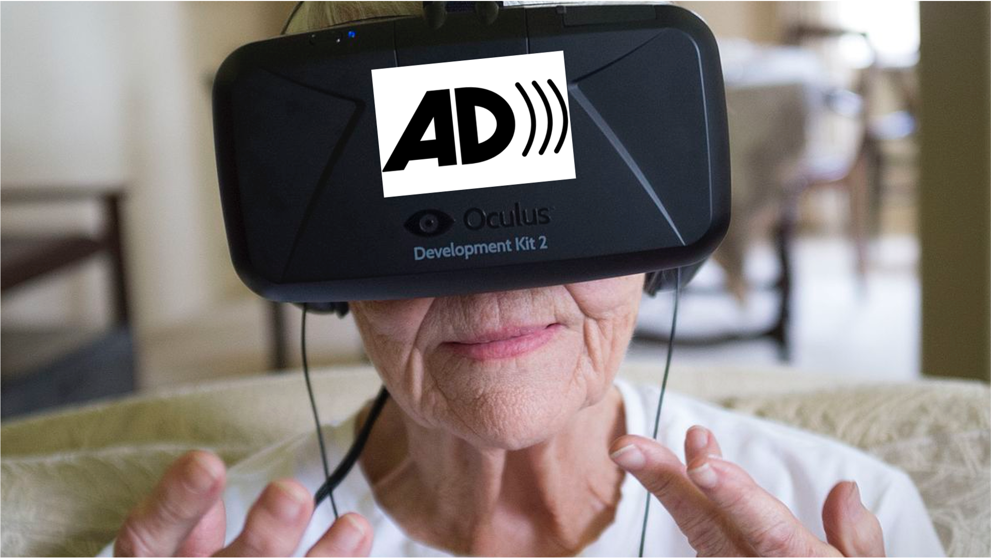 Elderly woman wearing Oculus Virtual Reality Headset with Audio Description logo