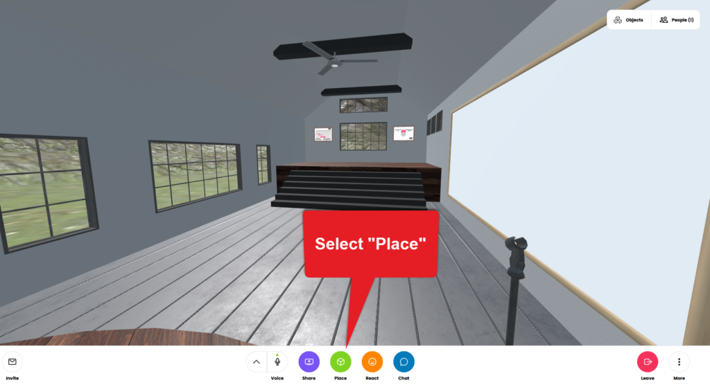 Screenshot of Hubs in a long room with stairs to a stage and a white board on the right. Selecting "Place" from the menu