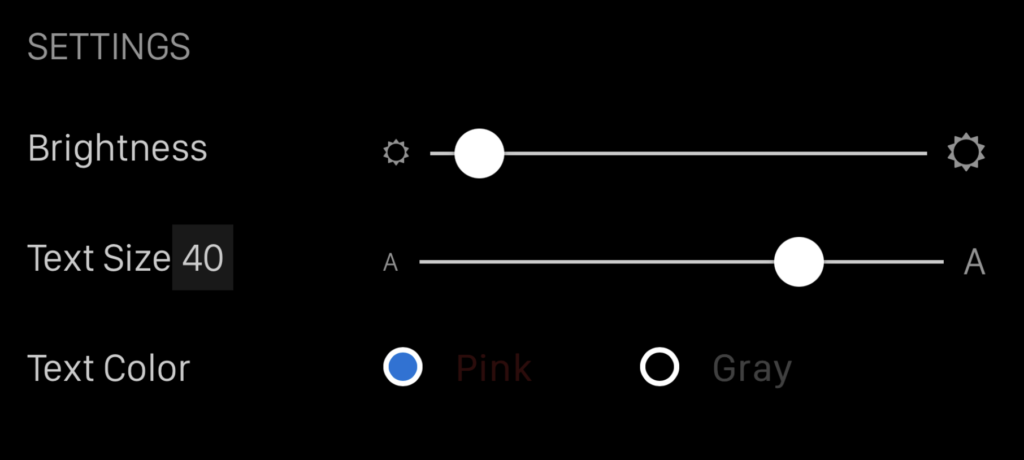 Screenshot of Settings for Brightness and text size with their sliders and text color choices of pink and grey with pink selected.