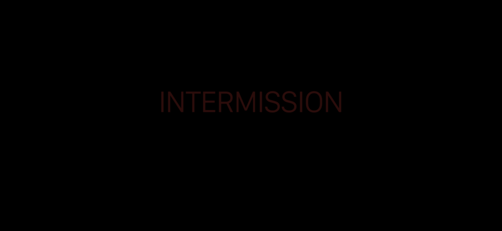 Screenshot of pink captions showing "INTERMISSION" in the default color and brightness setting.